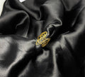 The Fluid Gold Wave Ring
