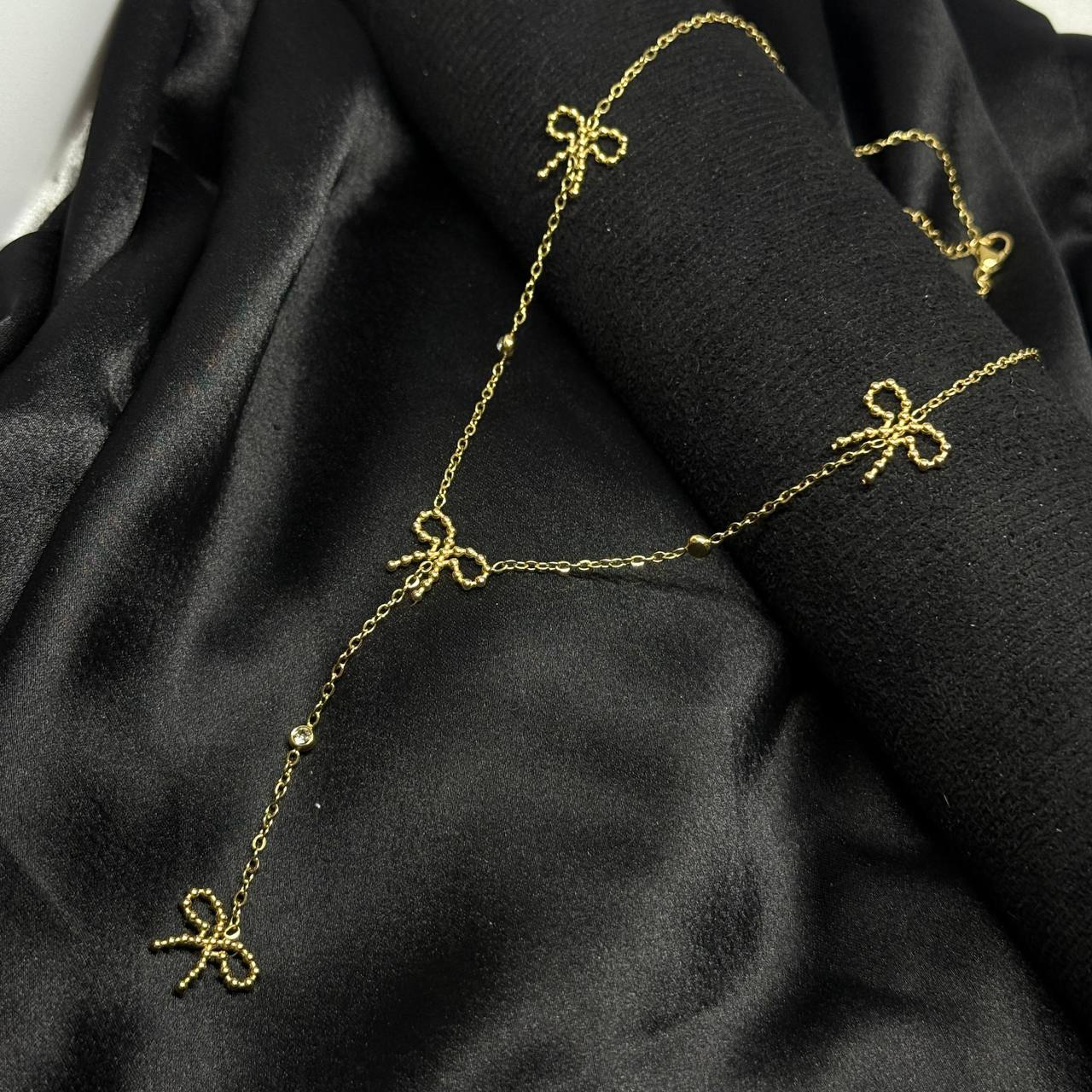 Golden Bow Charm Elegance Necklace
