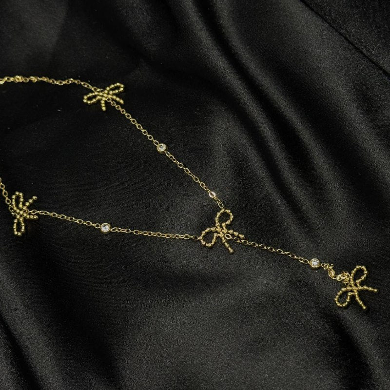 Golden Bow Charm Elegance Necklace