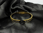 The Louis Vuitton Monogram Command Bangle