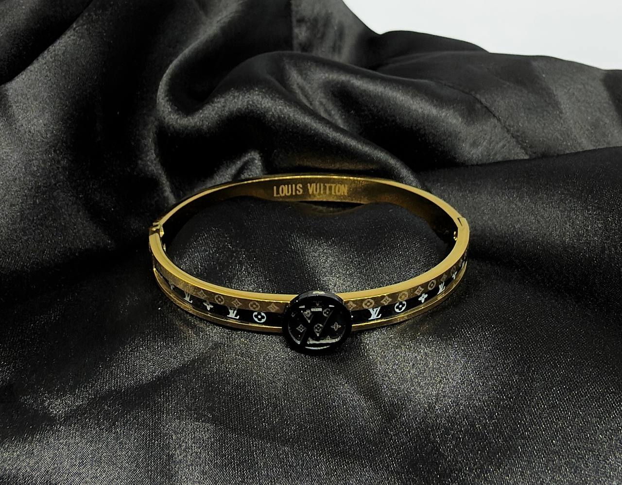 The Louis Vuitton Monogram Command Bangle