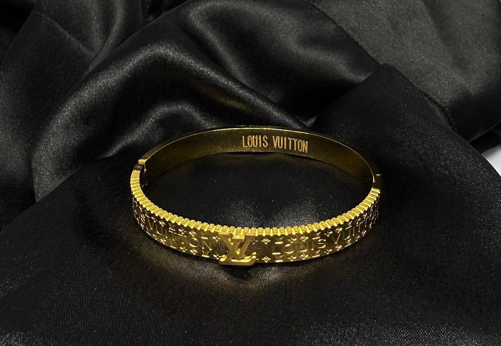 The Louis Vuitton Icon Lock Bracelet