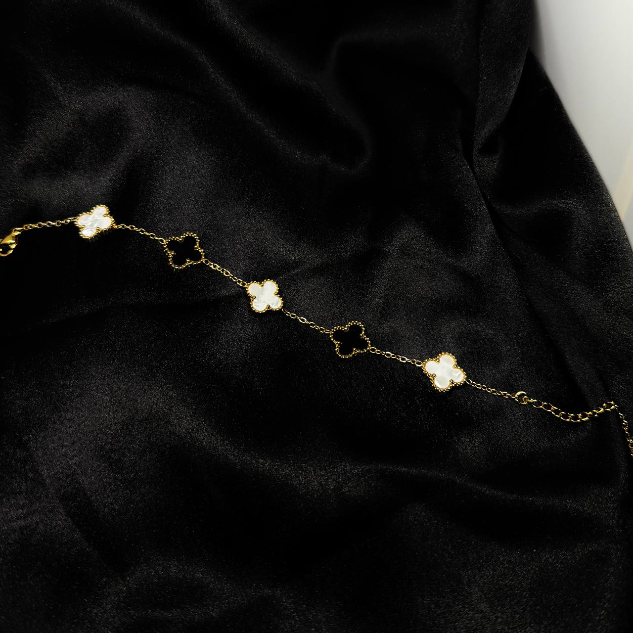 The Imperial Monogram Blanc Bracelet (one side black and one side white)