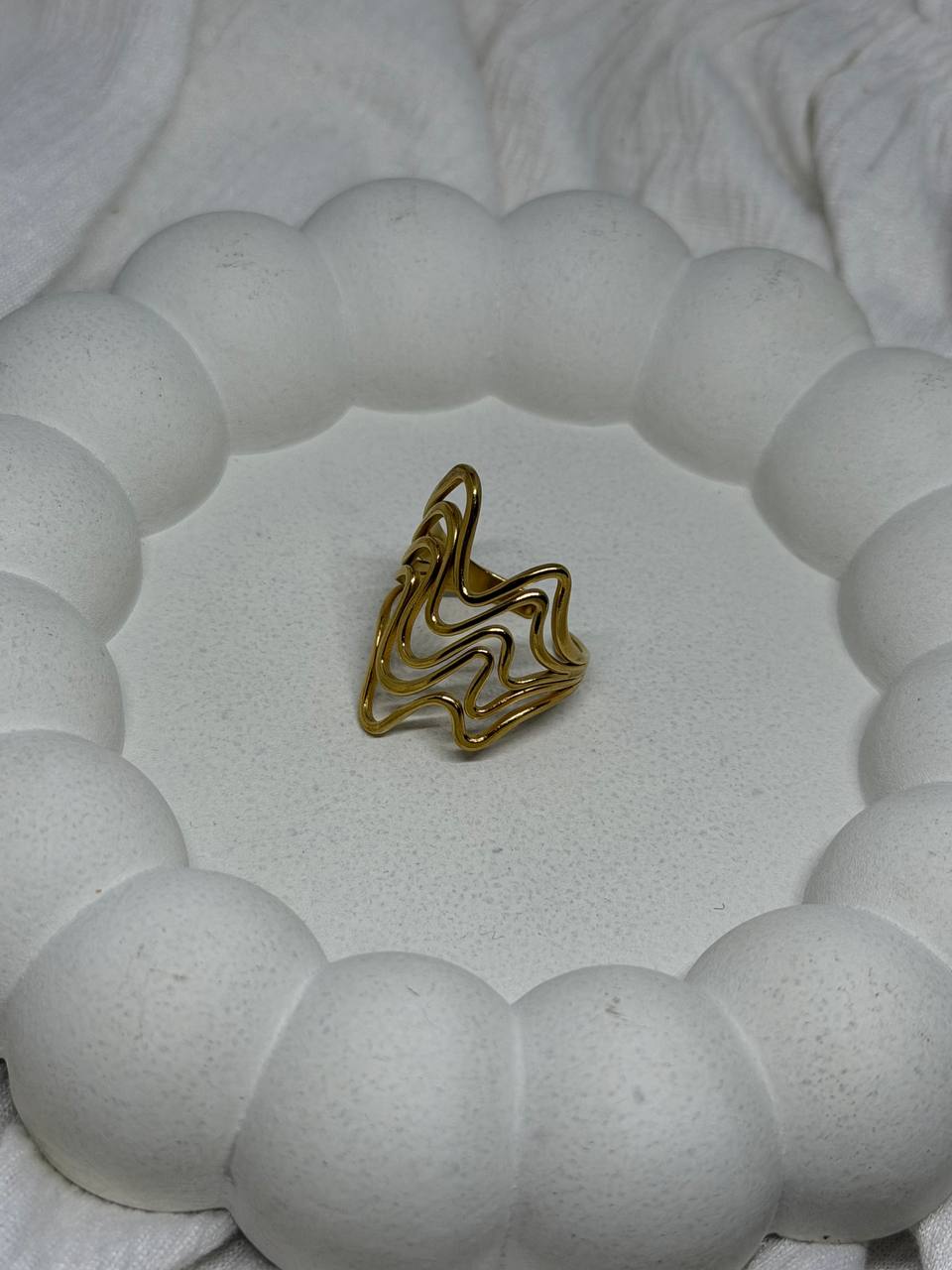 The Fluid Gold Wave Ring